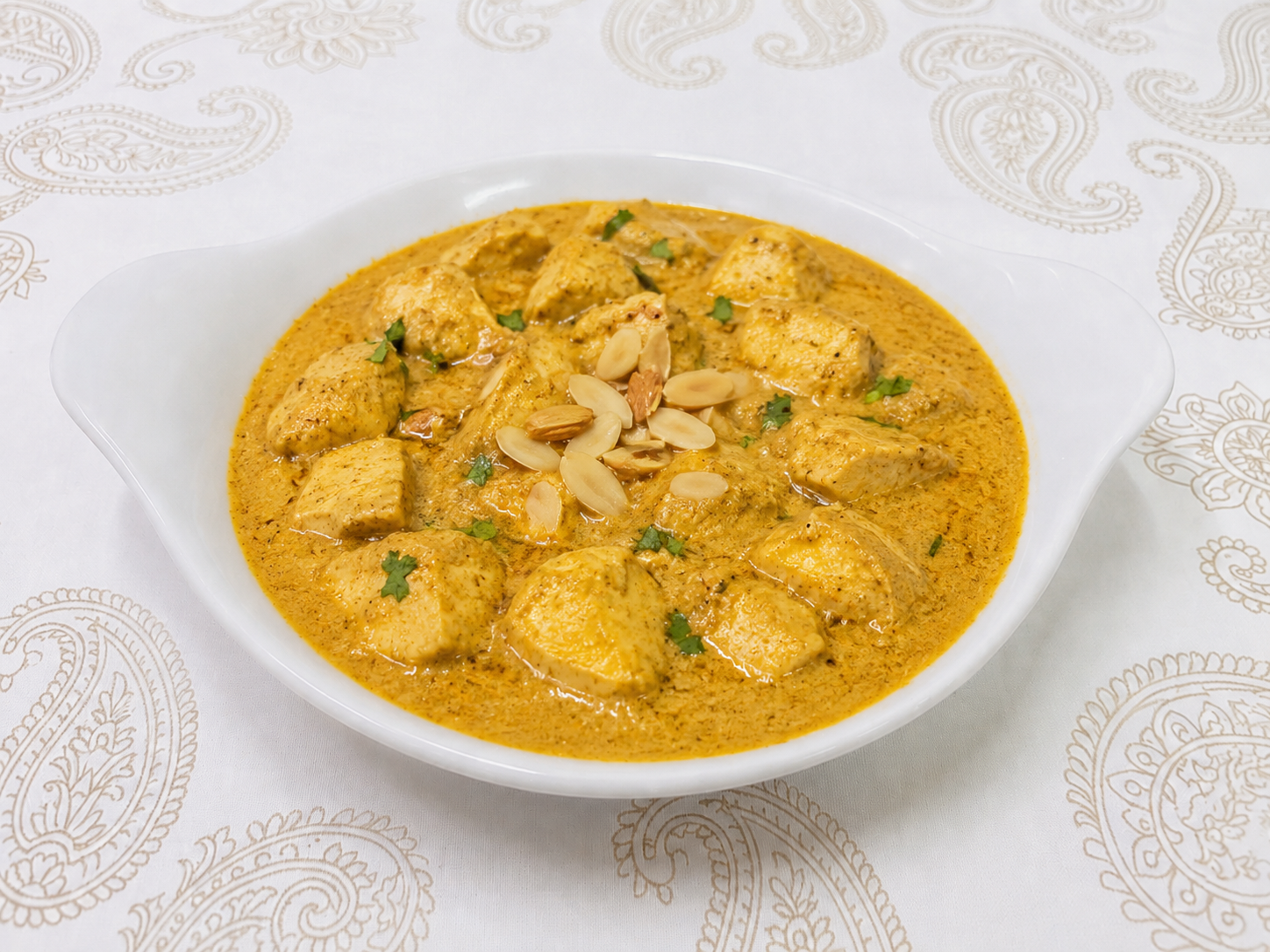 Korma curry con anacardos y cardamomo en Desi Galli Barcelona