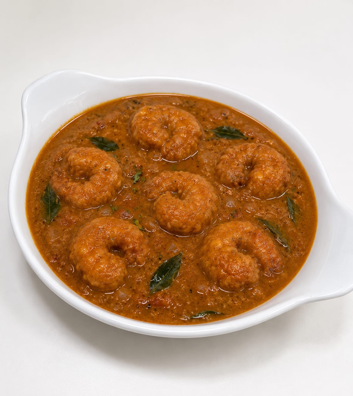Madras Prawns gambas en curry estilo Madrás con coco en Desi Galli Barcelona